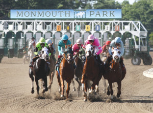 Horses leave the gate during a race last year. Racing at Monmouth Park will resume with a full schedule on May 10. -Courtesy Bill Denver/Equiphoto
