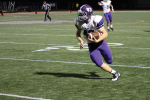 RFH quarterback Michael O’Connor races for 60-yards for a touchdown in the third quarter against Matawan. O’Connor finished the day with 120 yards on the ground for the Bulldogs. --Photo by Sean Simmons