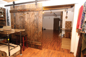 Hot yoga takes place in the studio space behind a  weathered barn door. There are usually two or three sessions a day.