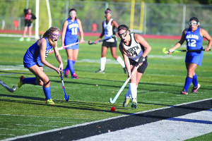 Middletown North's Eden Edelson, No. 14, scored the Lions' first goal of the game on a penalty stroke. --Sean Simmons