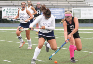 Lily Croddick, No. 7 of RFH, tries to get past Ally Massa, No. 15, of Middletown South. --Sean Simmons
