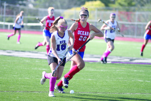 RFH's Maggie Jennings, No. 16, and Ocean Township's Caroline Hoff, No. 20, battle for the ball during Saturday's Shore Conference Tournament quarterfinal game. The Lady Bulldogs won 6-0 to remain unbeaten with a 16-0-2 record. --Sean Simmons
