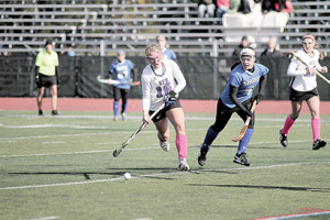 Maggie Jennings, No. 16 of RFH, tries to get past Katie Mannino, No. 4 of Shore Regional. --Sean Simmons