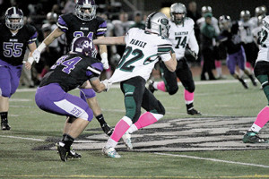 RFH linebacker Butchy Clark, No. 34, attempts to drag down Raritan running back Derek Ernst, No. 32. Ernst was the Rockets top rusher with 77 yards on 20 carries. -Sean Simmons
