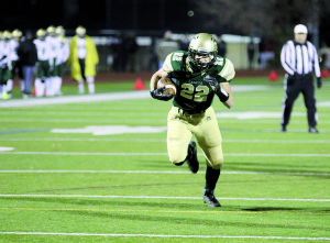 RBC running back Tommy Spernal, No. 22, rushes for some of his 166 yards and two touchdowns during last Friday's NJSIAA Non-Public 3 semifinal game against St. Joseph Regional of Montvale. --SEAN SIMMONS