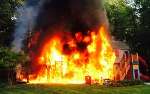 A play set went up in flames on the Diaco property, on Sailors Way in Rumson Tuesday, July 28. Photo: Austin Pomphrey