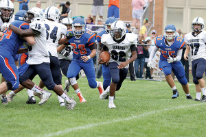 Syncere Richardson (32) of MD Prep receives good blocking from Isiah McClain (15) of Keansburg. Photo: Sean Simmons