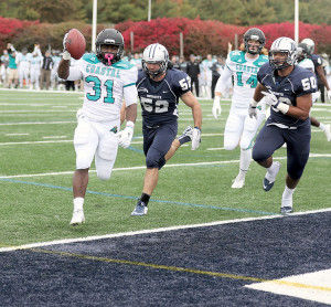 De’Angelo Henderson (31) of Coastal Carolina scores a touchdown on a one-yard run to give the Chanticleers a 10-7 lead. Henderson’s TD gave him one in 21 consecutive games, a new FCS record previously held by Monmouth’s all-time leading rusher David Sinisi. Photo: Sean Simmons