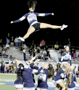 Members of the Middletown South cheerleading squad perform their routine at halftime. Photo: Sean Simmons