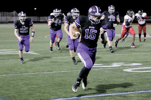 FH quarterback Michael O'Connor (15) rushed for a game-high 165 yards on 12 carries and also scored on runs of 45 and 54 yards. Photo: Julie Gilbertson