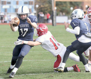 Keyport’s suffocating defense put heavy pressure on MD Prep quarterback Kyle Devaney (17) all afternoon. Photo: Sean Simmons
