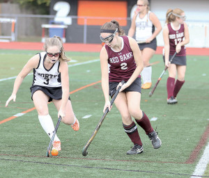 Julia Devries (3) of Middletown North tries to get past Katie Peter (2) of Red Bank Regional during Monday’s NJSIAA North Jersey Section 2, Group 3 second round game at Middletown North. Devries scored a goal for North. Photo: Sean Simmons