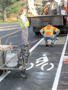 Workers this week installed bicycle lane stenciling on Rumson and Ridge roads through portions of Fair Haven, Rumson and Little Silver. Local officials hope this will be the first in an ongoing effort establishing a Two River bike lane connecting a number of local communities. Photo: John Burton