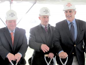 Keansburg Mayor George Hoff, left, Edward Martoglio (c.) with RPM developers, and state Senator Joseph M. Kyrillos Jr., par- ticipate in a ceremonial groundbreaking last week for a large mixed use development project on Keansburg’s waterfront. Photo: John Burton