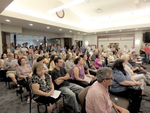 Hazlet and Middletown residents look on during an open-forum portion of the special JCP&L related meeting on June 20. 