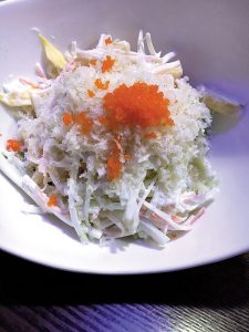 The Mango Kani Salad is a refreshing starter on a steamy summer night.