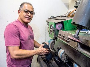 ￼Marco Machado, who owns and operates Fernando’s Shoe Repair in Red Bank, came to the U.S. 32 years ago in search of a better life. 