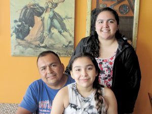 El Salvador-born Hugo Paredes, with help of his daughters Thania and Stephanie, now operate Paredes’ latest business venture, Carlos O’Connor’s Mexican restaurant in Red Bank. Paredes owns and operates other local businesses.
