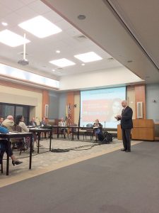On August 16, Freeholder John P. Curley speaks to the Brookdale Community College Board of Trustees and the public about the value of public transportation.  