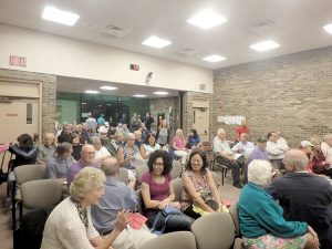 Residents seeking to be heard on the issue of turf fields at Cross Farm Park filled the meetingroom on Tuesday. The governing body approved the fields. Photo by Jay Cook.