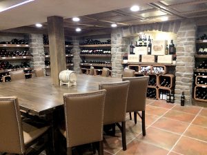 The bottle-lined wine room, downstairs at the Fromagerie, serves small parties.