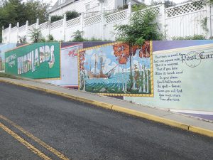 The Miller Street mural is comprised of eight postcards, all depicting Highlands’ unique history.