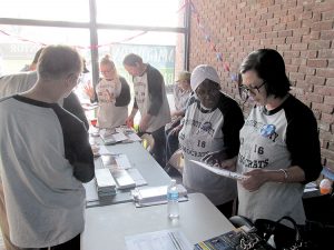 Democratic Party volunteers prepare for a day of canvassing in Belmar on Sunday.