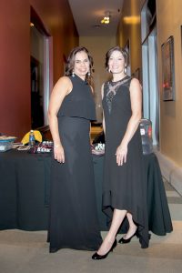 Jennifer Chauhan, left, and Allison Tevald, founders of Project Write Now, conduct the organization’s first fundraiser on Tuesday evening at the Two River Theater in Red Bank.