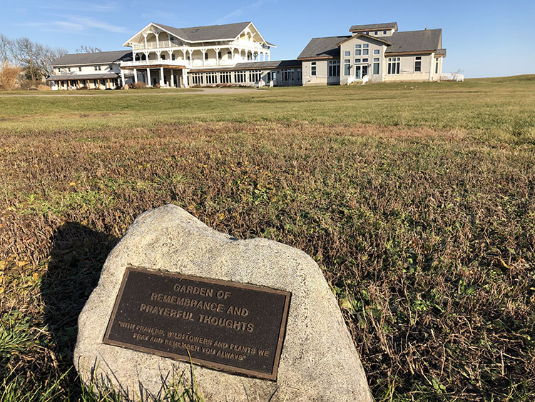 This plaque on the grounds of the Stella Maris Retreat House reads “Garden of Re- membrance and Prayerful Thoughts.”
