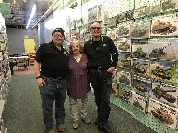 Members of the Hobbymasters family are closing up shop in the next two months. Shop owner Arlene Placer Cosgrove, posed with son Robert Placer, left, and husband Tom Cosgrove, right. 