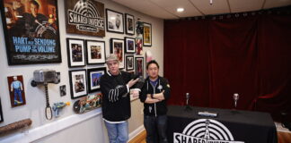From left, Michael Zapcic and Ming Chen in front of one of their two podcast studios.