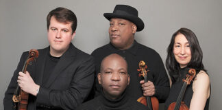 Members of the Harlem Chamber Players. Back row: violist William Frampton, violinist Ashley Horne and violinist Claire Chan. Seated: cellist Wayne Smith.