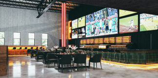 Multiple seating areas amidst big screen televisions will be a hallmark of the new Baseline Social sports bar and restaurant.