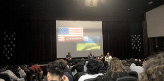 Red Bank Regional High School seniors gathered in the auditorium last Tuesday for a living history lesson on the war in Ukraine presented by David and Natasha Halbout and their niece, Maiia Dvorina, who fled from Ukraine last spring. The presentation was arranged by AP English teacher Andrew Forrest.