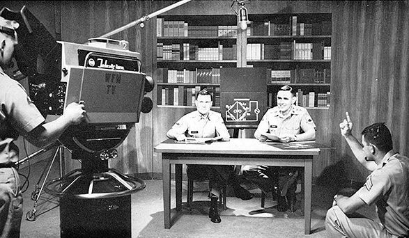 A studio scene during a course in basic electronics featuring at two-instructor team. Courtesy National Archives