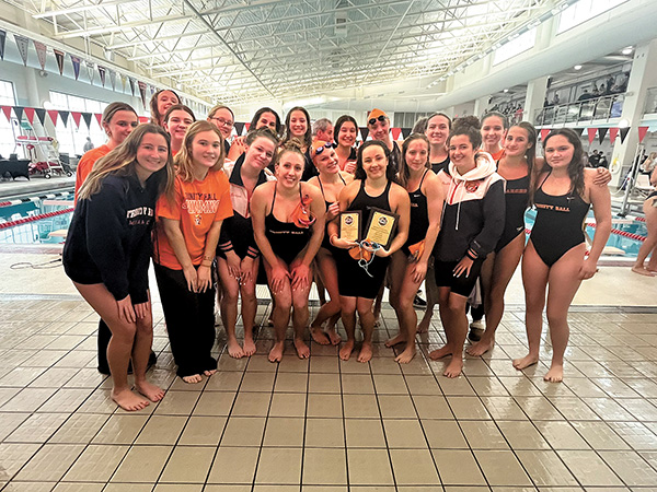 The Trinity Hall Monarchs won the Shore Conference team championship with two relay wins and an individual title for Maxine Camillone in the 100 butterfly.