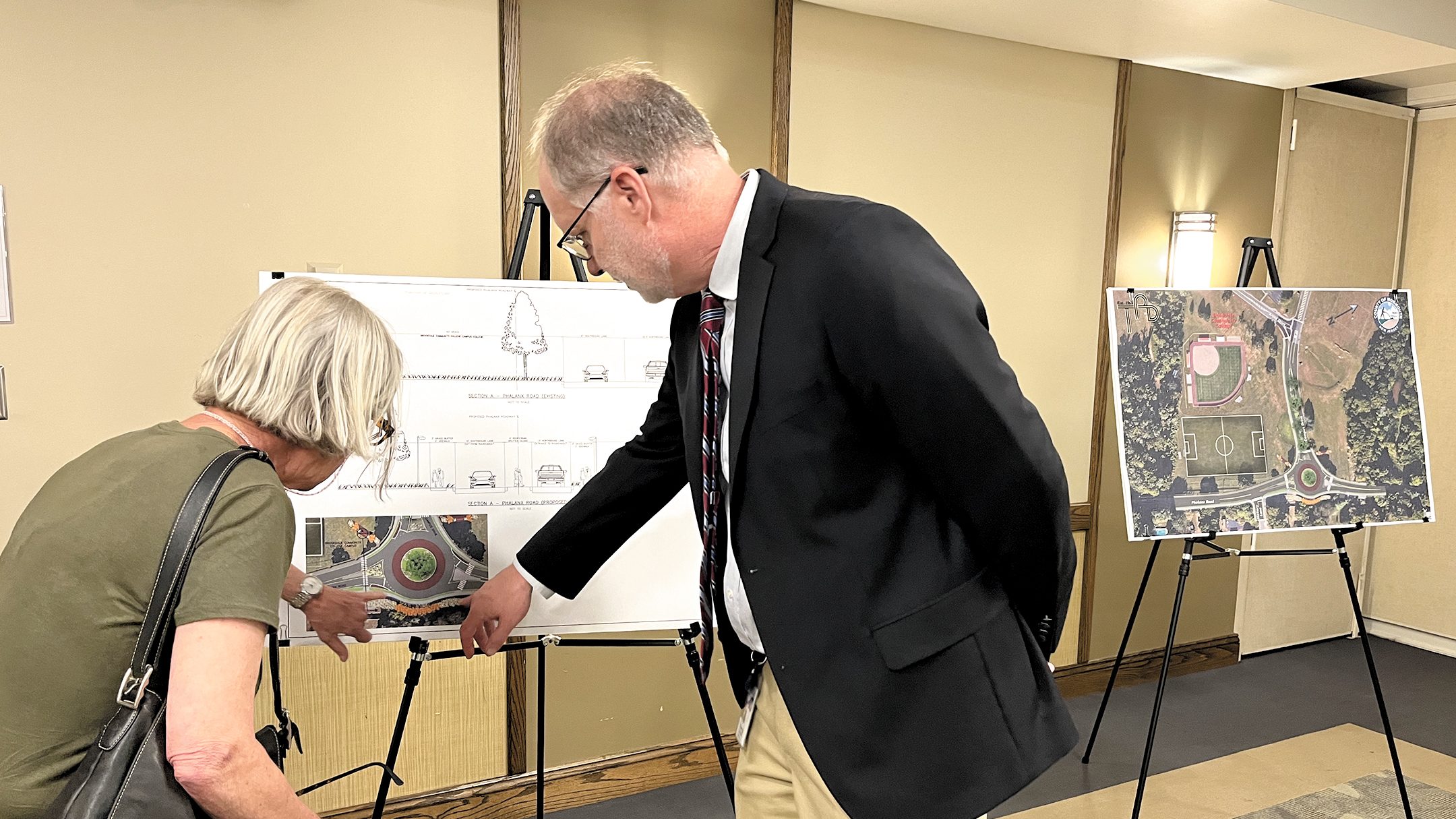 County engineer Michael Nei explained the function of a roundabout for managing traffic flow at the intersection of Phalanx Road and Campus Drive during a public input session at Brookdale’s Student Life Center. Sunayana Prabhu 