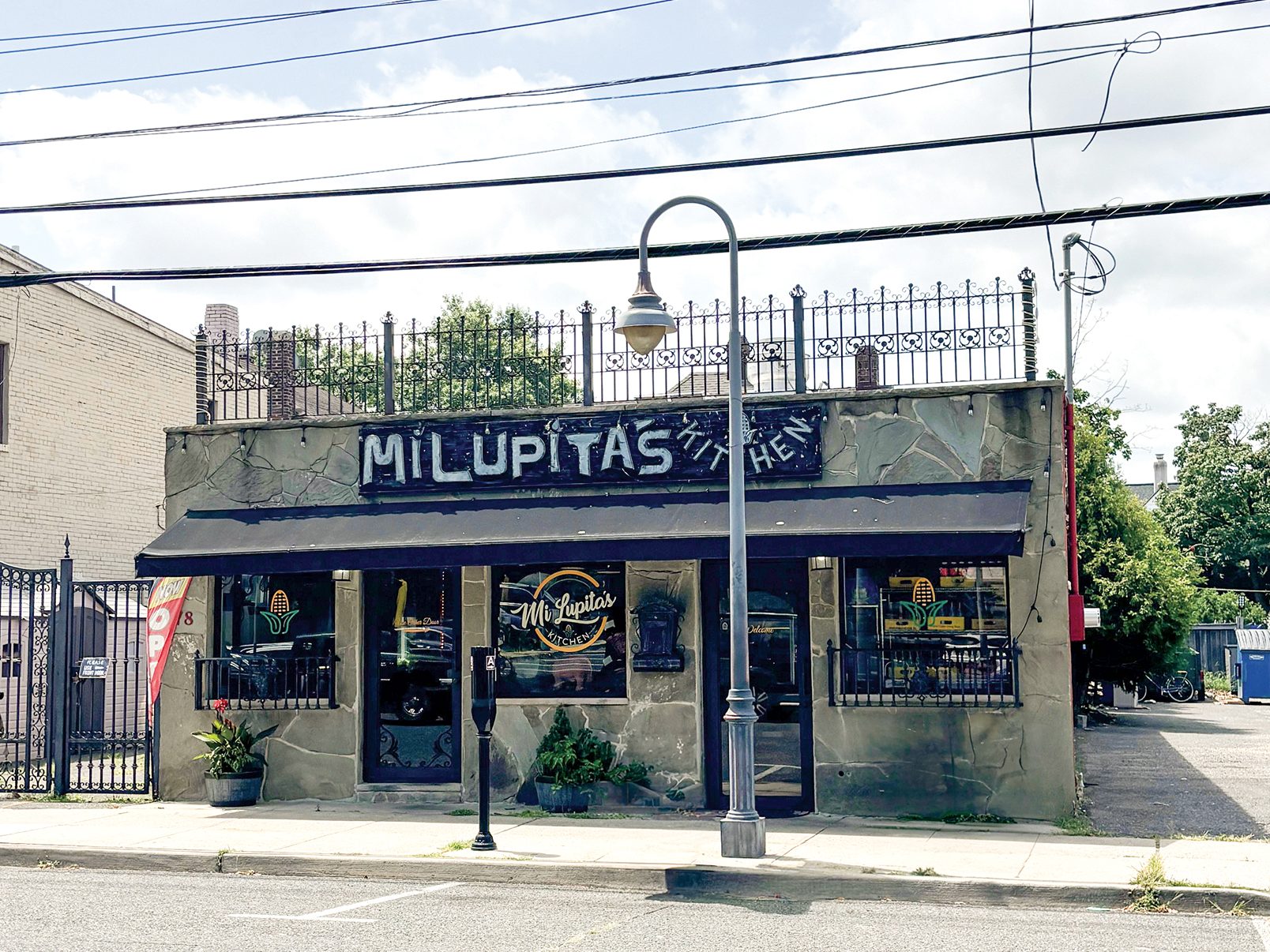 Three buildings, including the one that houses Mi Lupita’s Kitchen, will be demolished to make way for a four-story residential building at 78 Bridge Ave. Stephen Appezzato