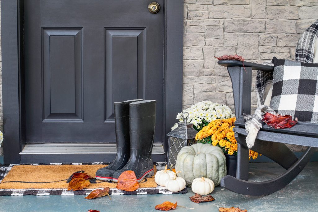 Pumpkins come in a wide range of colors and just a few artfully placed with color-coordinated flowers can have a big impact in a small area.